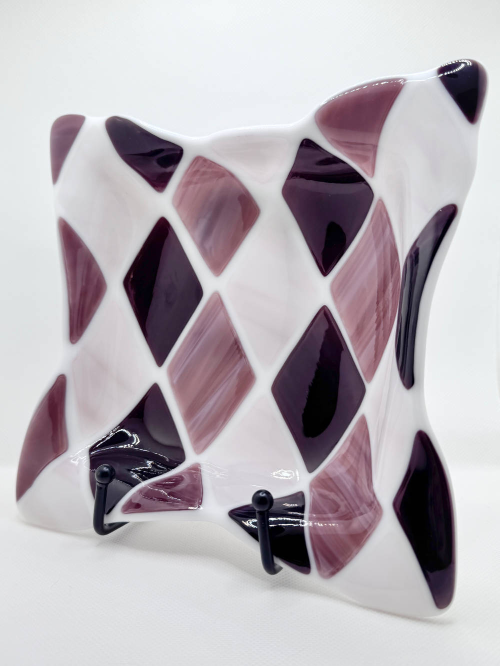 purple and white fused glass bowl with a diamond pattern